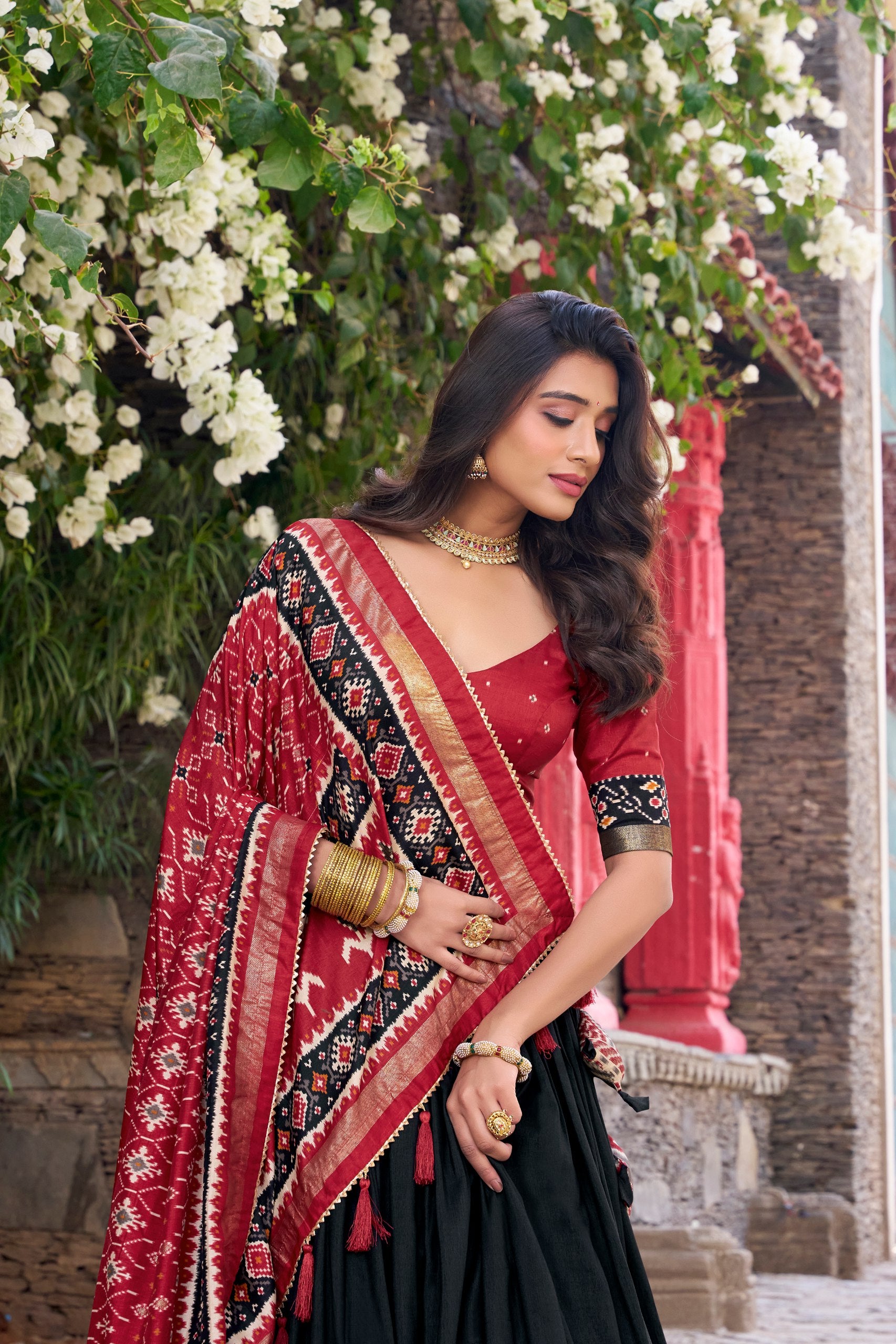 Traditional Wear Black Color Tussar Silk With Heavy Patola Printed Designer Lehenga Choli