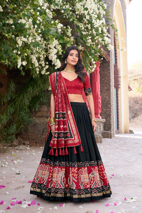 Traditional Wear Black Color Tussar Silk With Heavy Patola Printed Designer Lehenga Choli