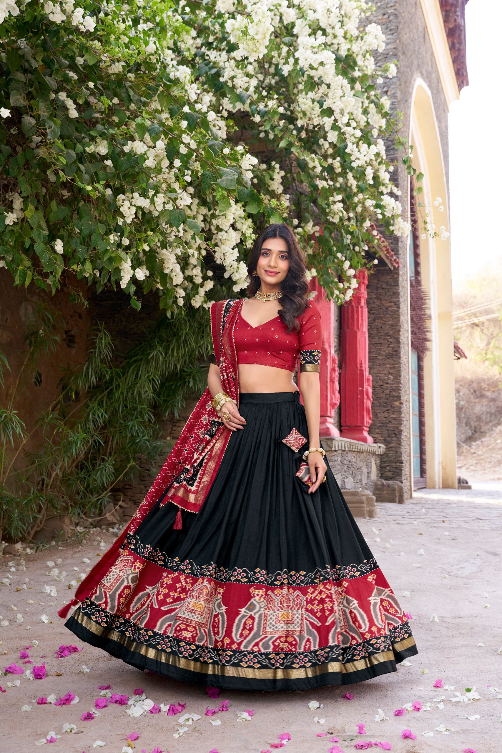 Traditional Wear Black Color Tussar Silk With Heavy Patola Printed Designer Lehenga Choli