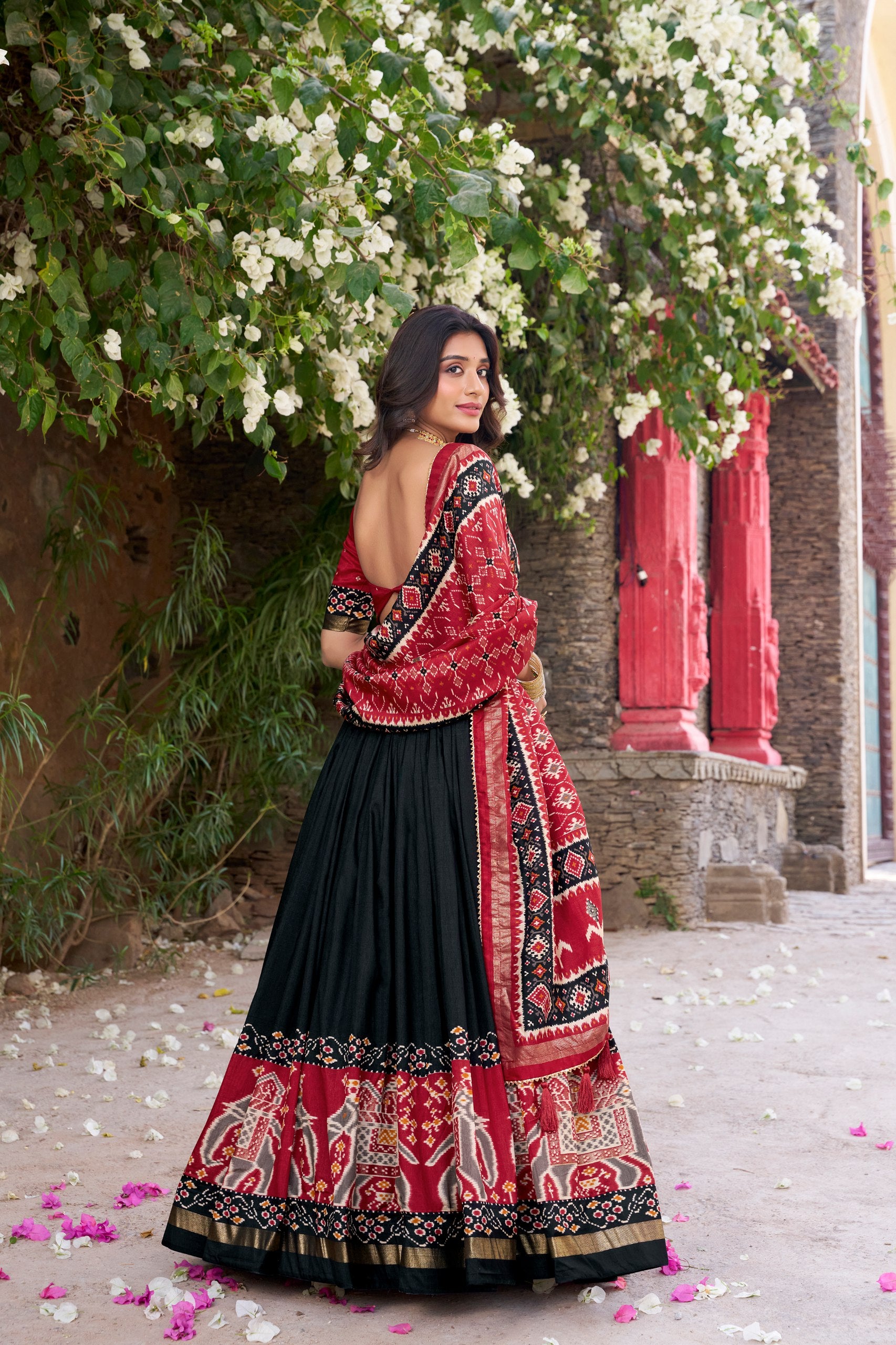 Traditional Wear Black Color Tussar Silk With Heavy Patola Printed Designer Lehenga Choli
