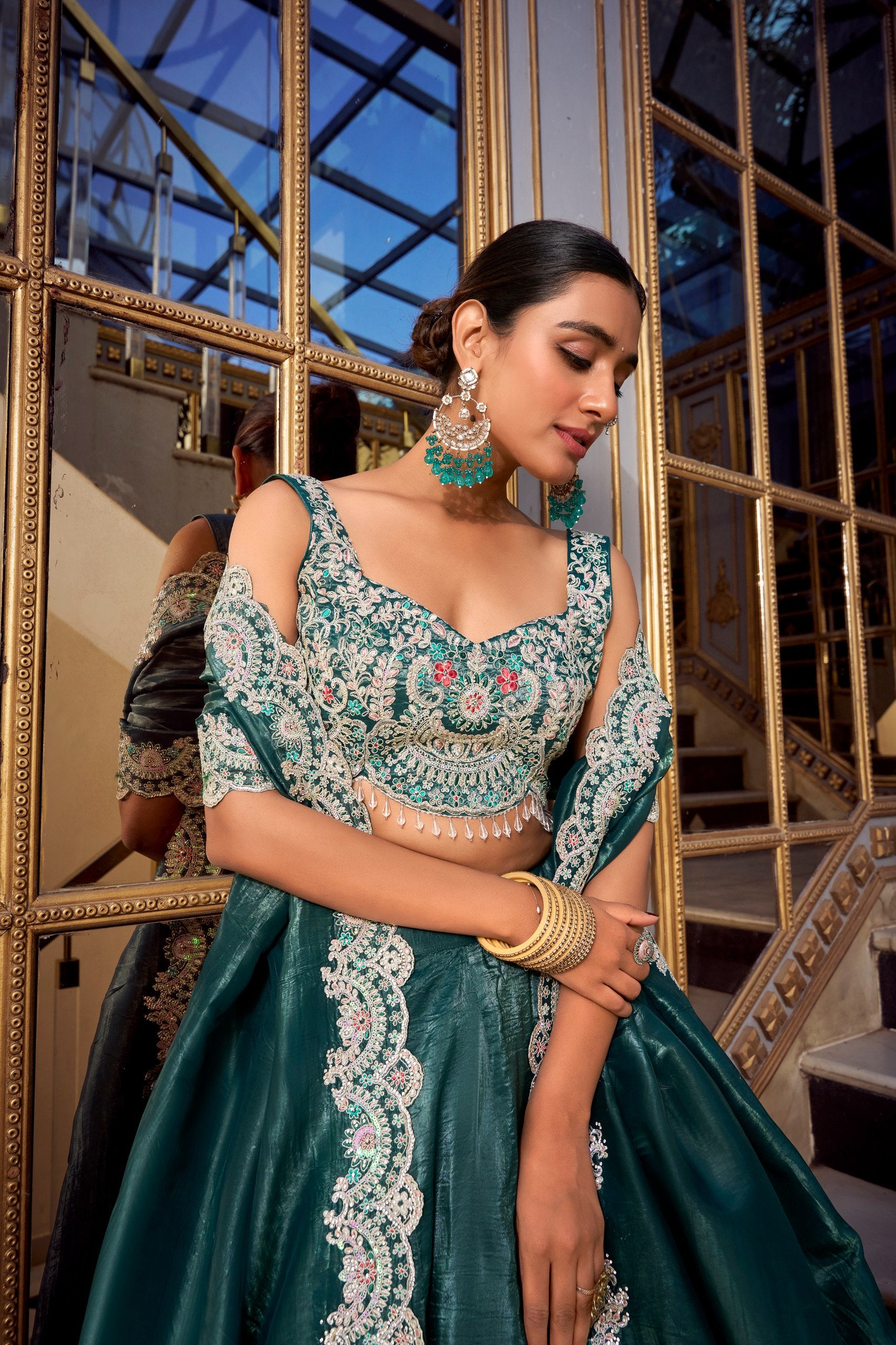 Luxuriant Teal Color Gold Crush Lehenga With Sequins And Thread Embroidery With Jarkan Diamond Work Blouse