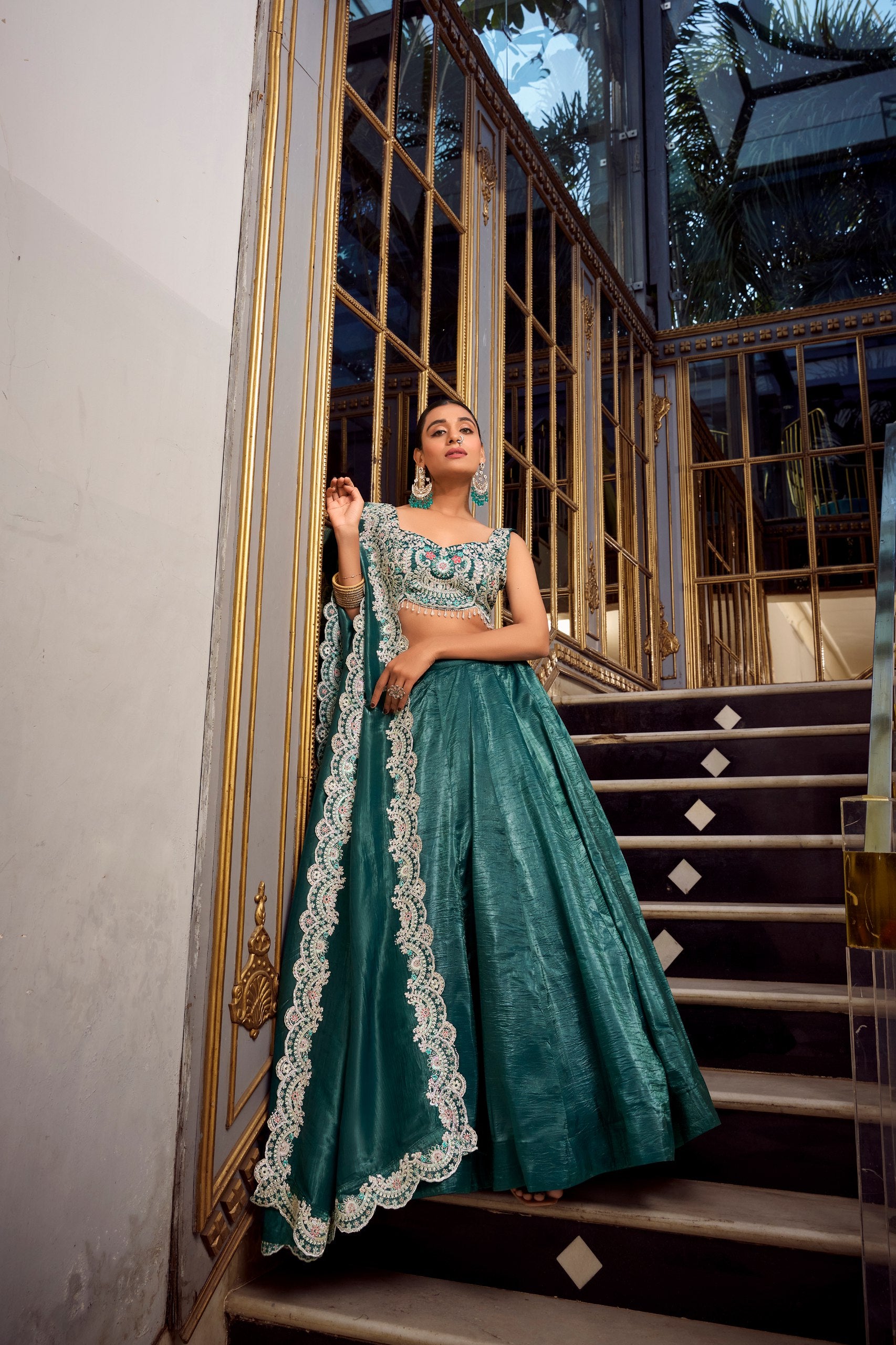 Luxuriant Teal Color Gold Crush Lehenga With Sequins And Thread Embroidery With Jarkan Diamond Work Blouse
