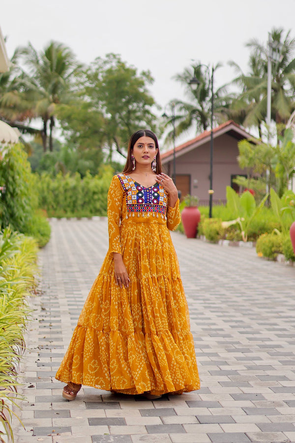Navratri Wear Yellow Color Kodi Lace And Mirror Work Garba Gown