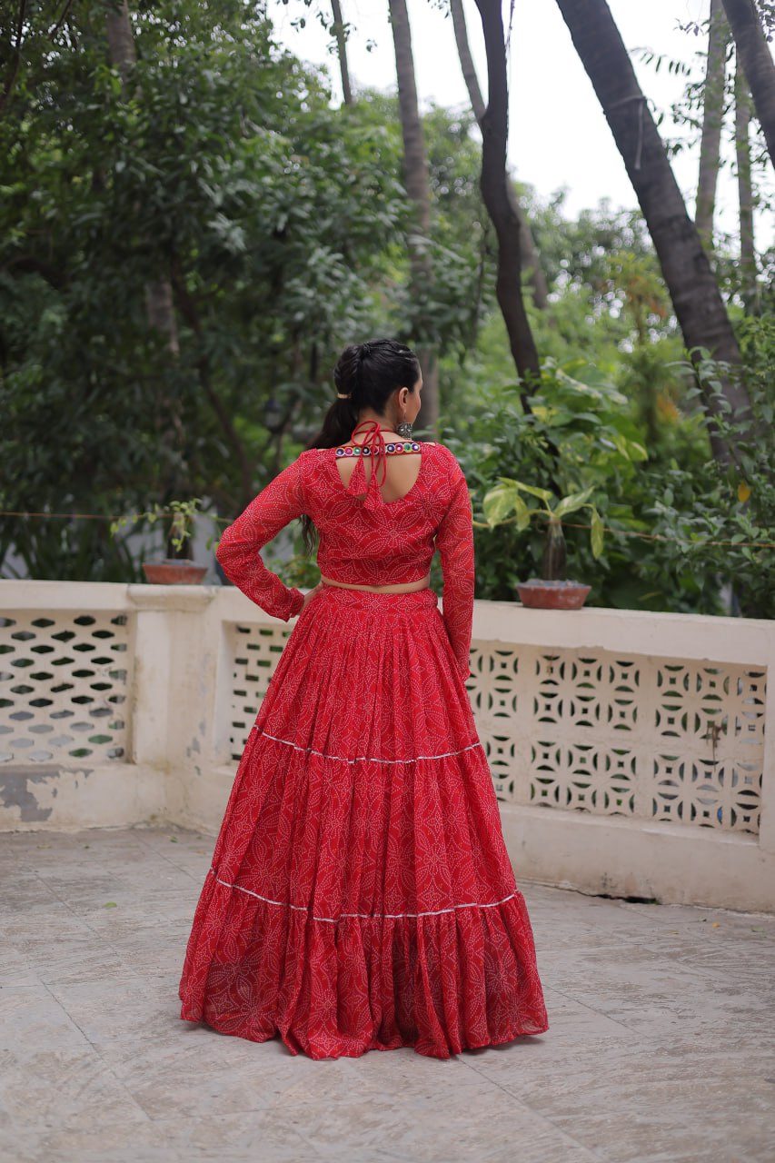 Navratri Wear Bandhej Print Georgette Lehenga With Gamthi Embroidered Top