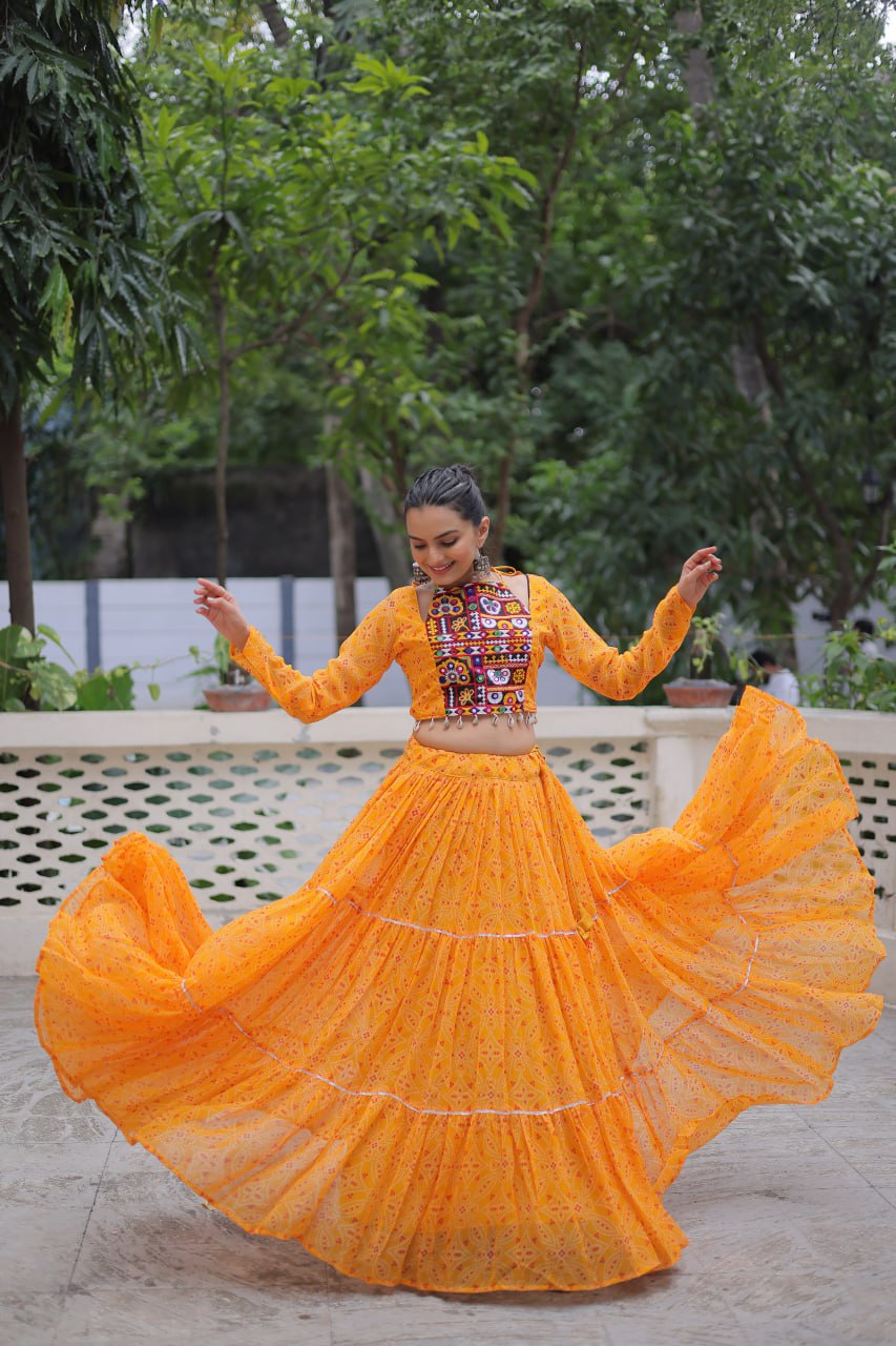 Navratri Wear Bandhej Print Georgette Lehenga With Gamthi Embroidered Top