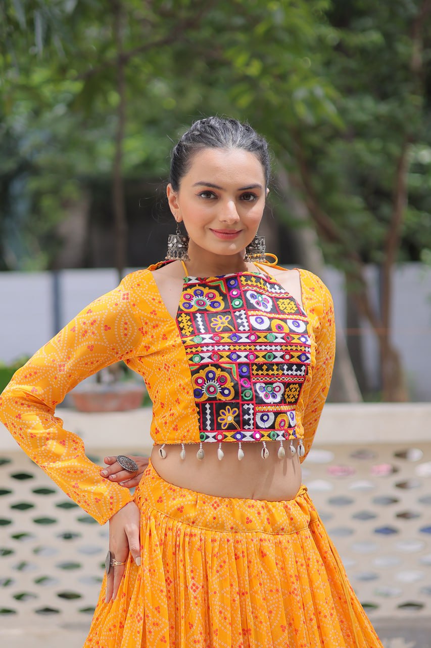 Navratri Wear Bandhej Print Georgette Lehenga With Gamthi Embroidered Top