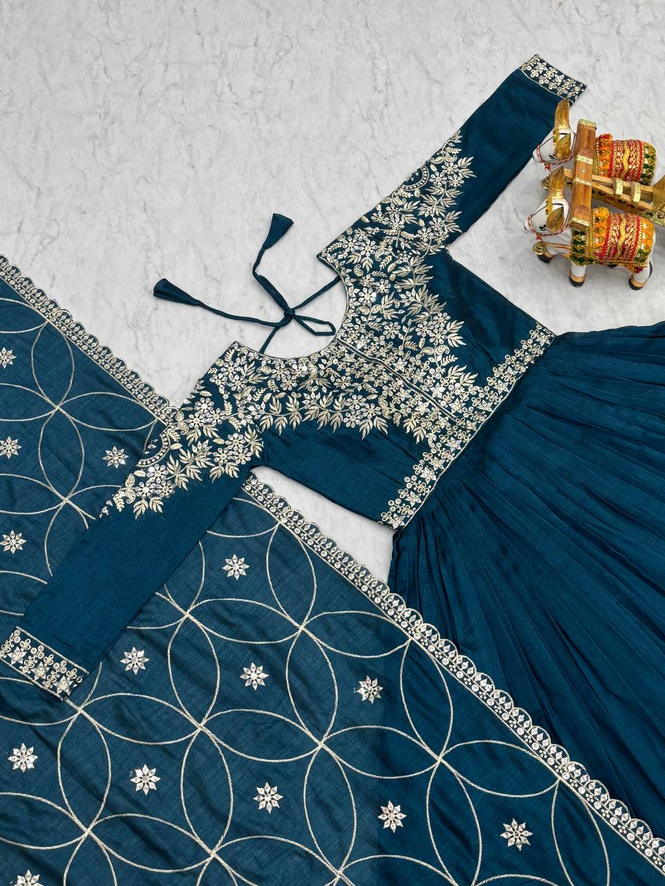 Luxuriant Teal Blue Color Pure Vichitra Silk And Sequence Embroidery Work Gown