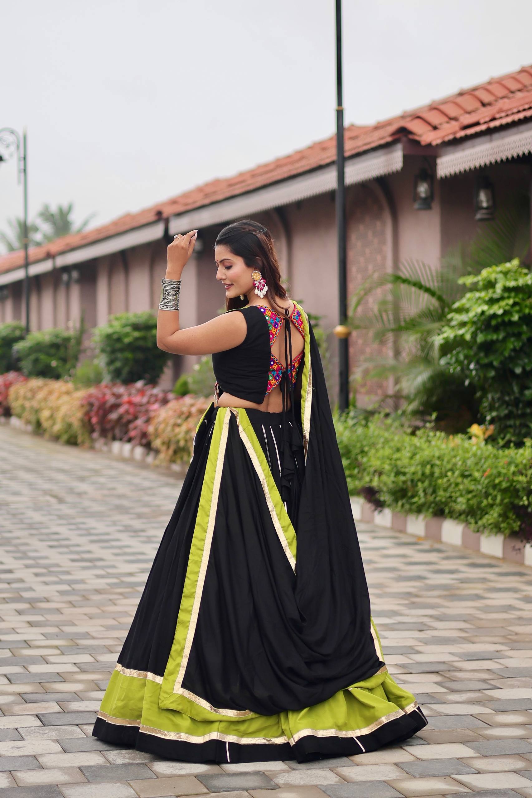 Navratri Festive Wear Black And Green Color Gamathi Work Lehenga Choli