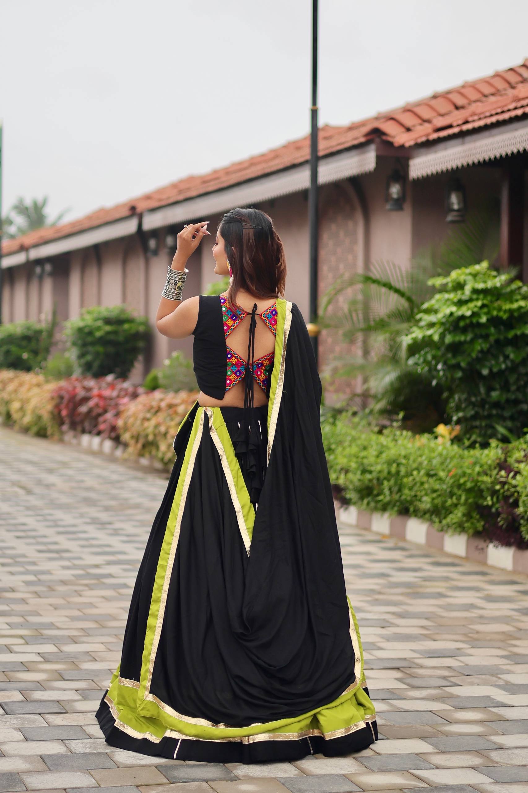Navratri Festive Wear Black And Green Color Gamathi Work Lehenga Choli