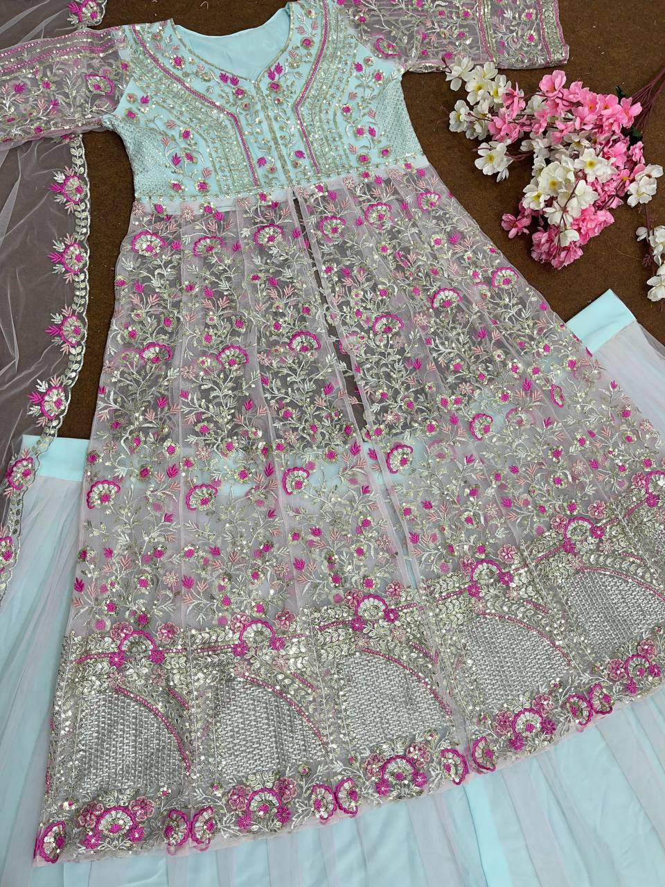 Presenting Peach And White Color Heavy Soft Net With Embroidery Sequence Work Top With Lehenga