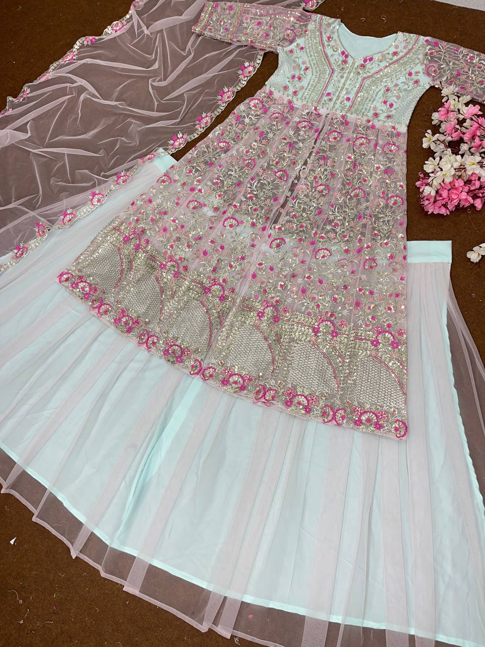 Presenting Peach And White Color Heavy Soft Net With Embroidery Sequence Work Top With Lehenga