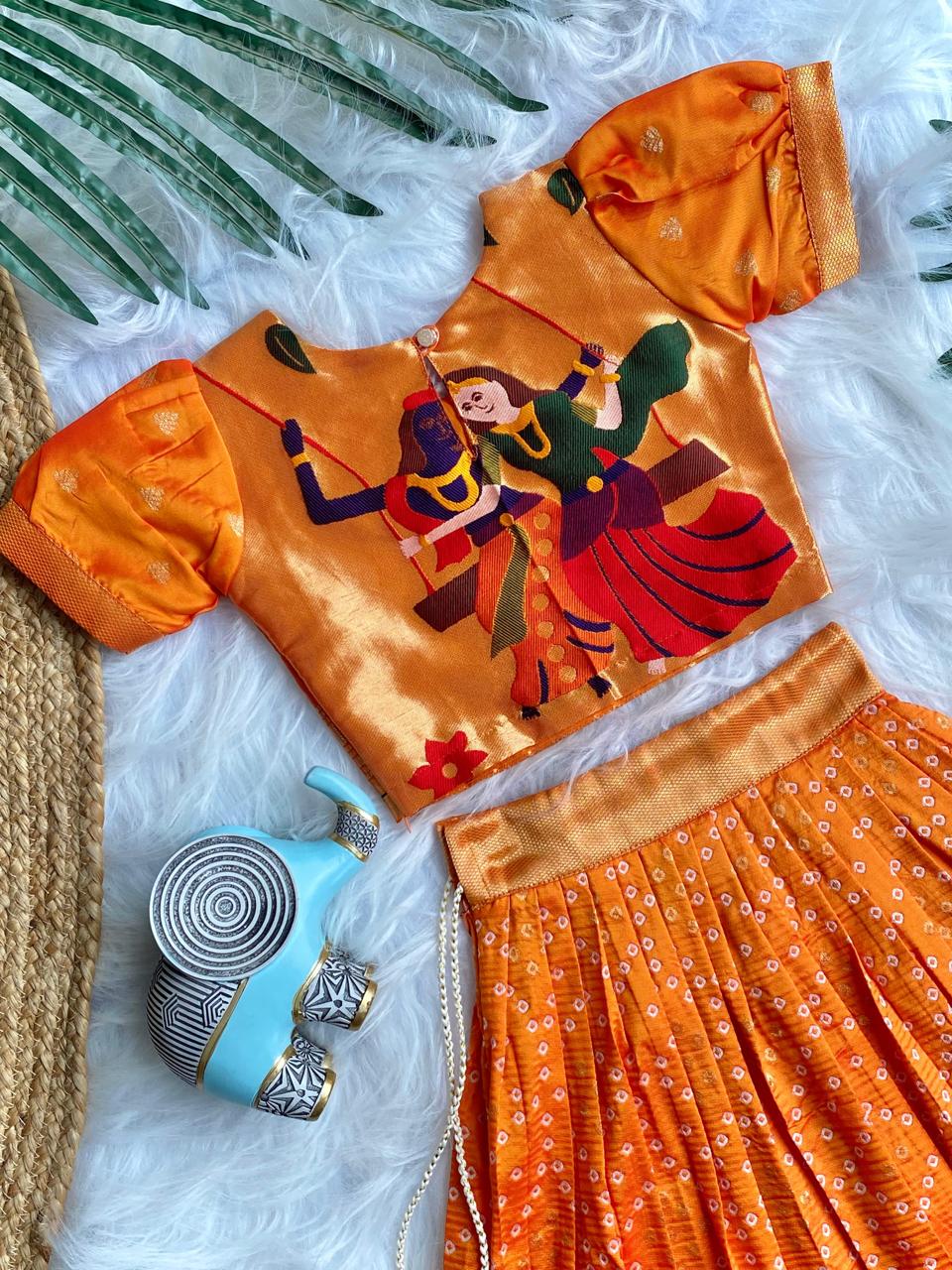 Beautilful Orange Color Designer Bandhej Kids Lehenga Choli