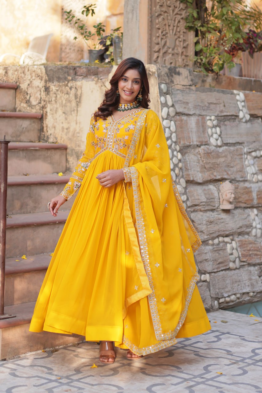 Marriage Special Yellow Color Faux Blooming With Embroidery Zari Sequins Work Designer Gown