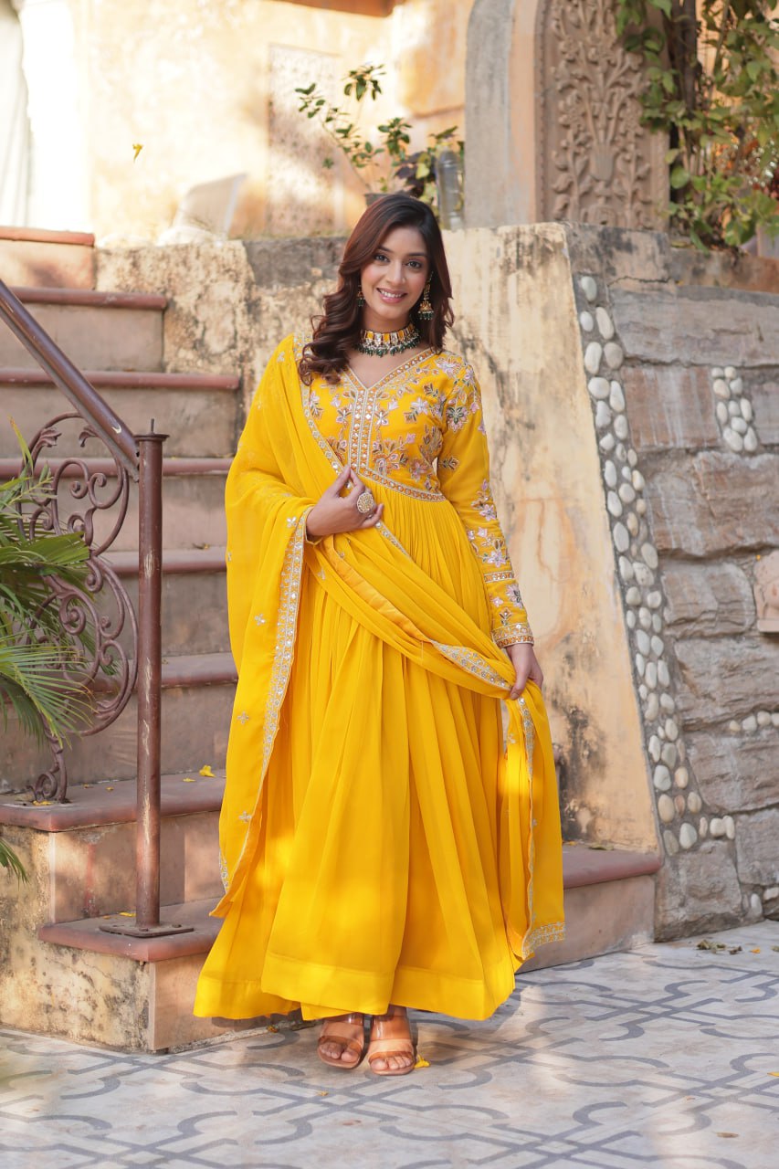 Marriage Special Yellow Color Faux Blooming With Embroidery Zari Sequins Work Designer Gown