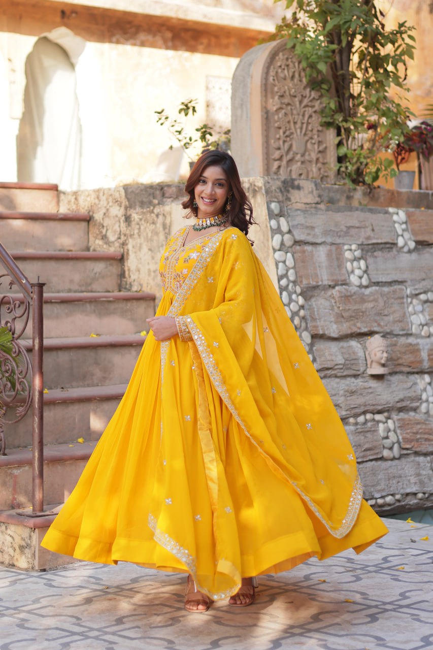 Marriage Special Yellow Color Faux Blooming With Embroidery Zari Sequins Work Designer Gown