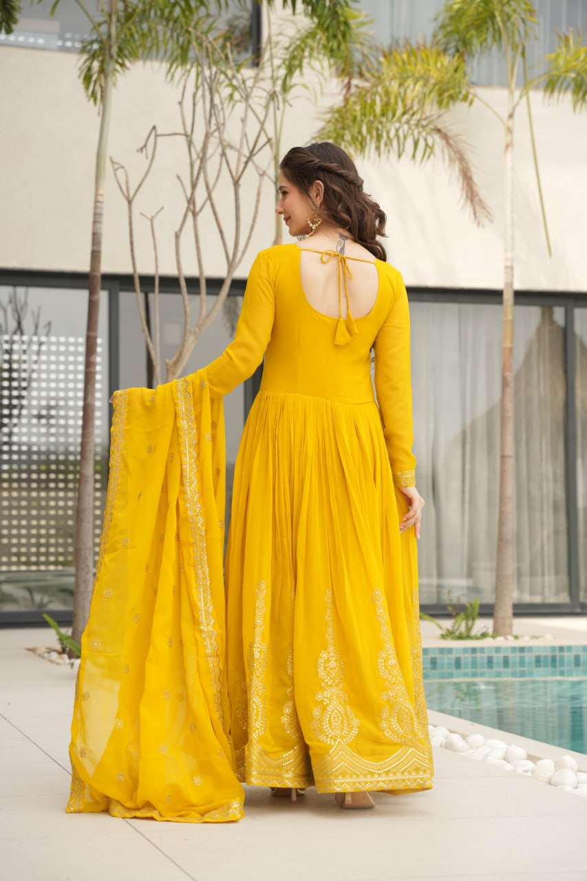 Reception Wear Yellow Color Faux Blooming With Embroidery Zari Sequins Work Designer Gown