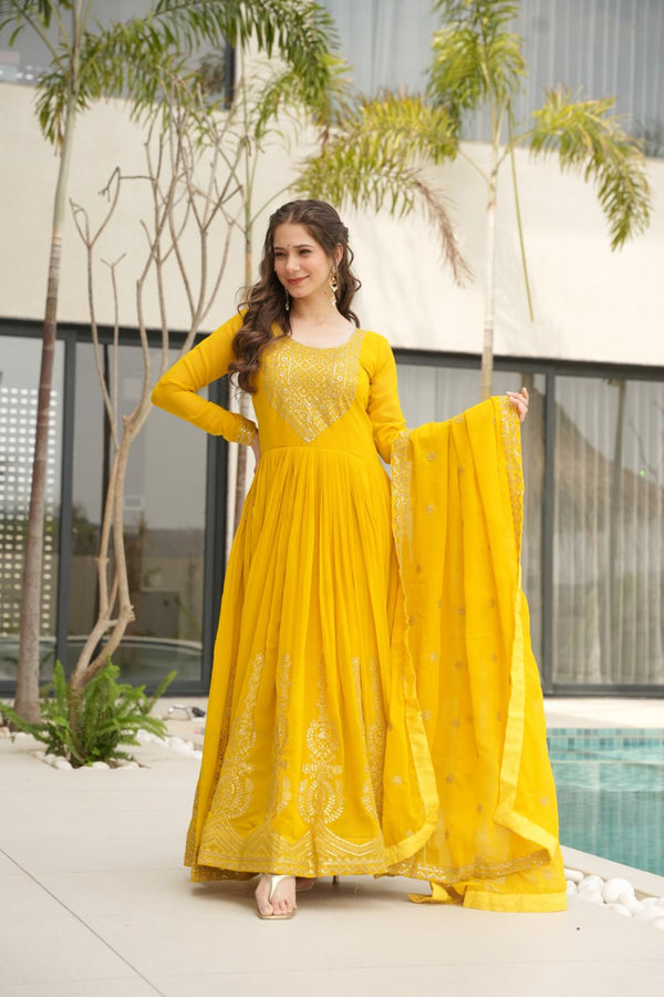 Reception Wear Yellow Color Faux Blooming With Embroidery Zari Sequins Work Designer Gown