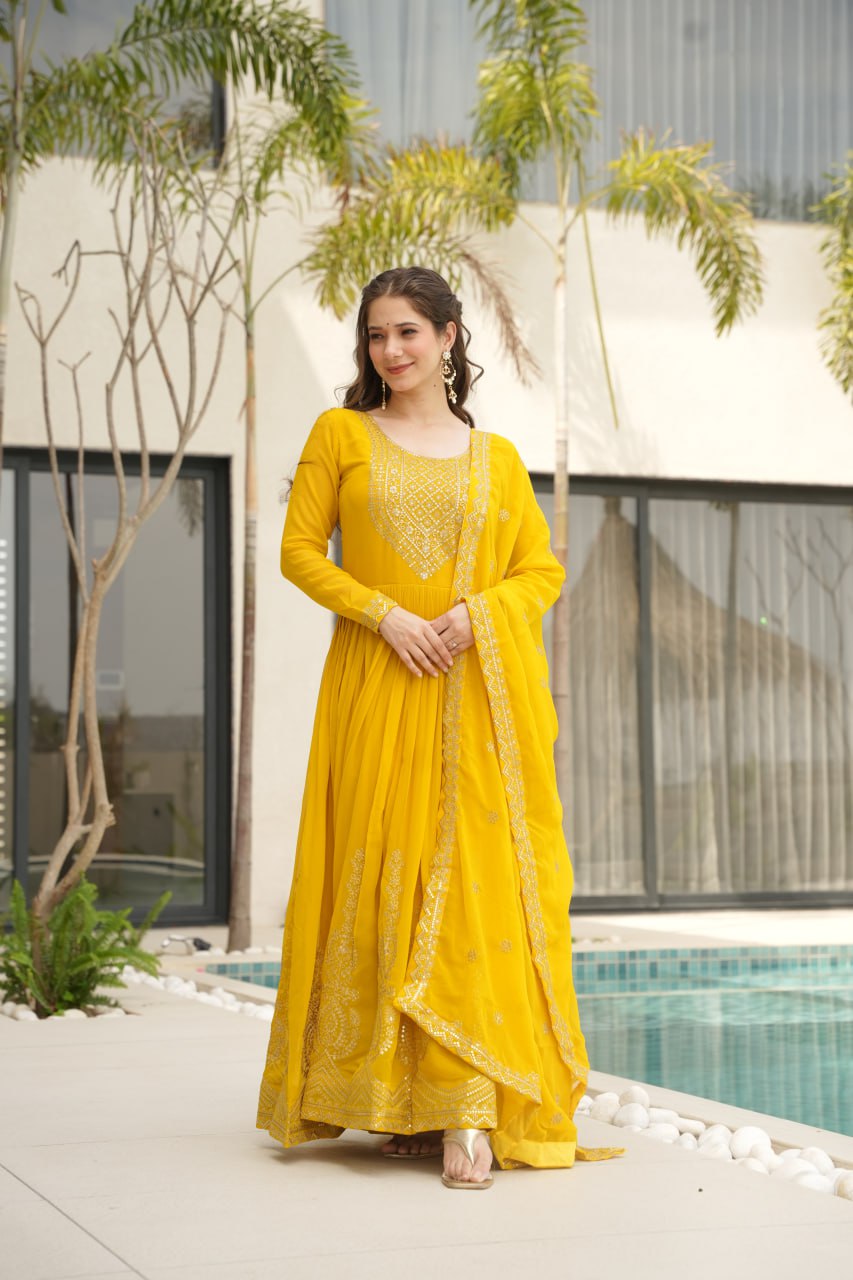 Reception Wear Yellow Color Faux Blooming With Embroidery Zari Sequins Work Designer Gown