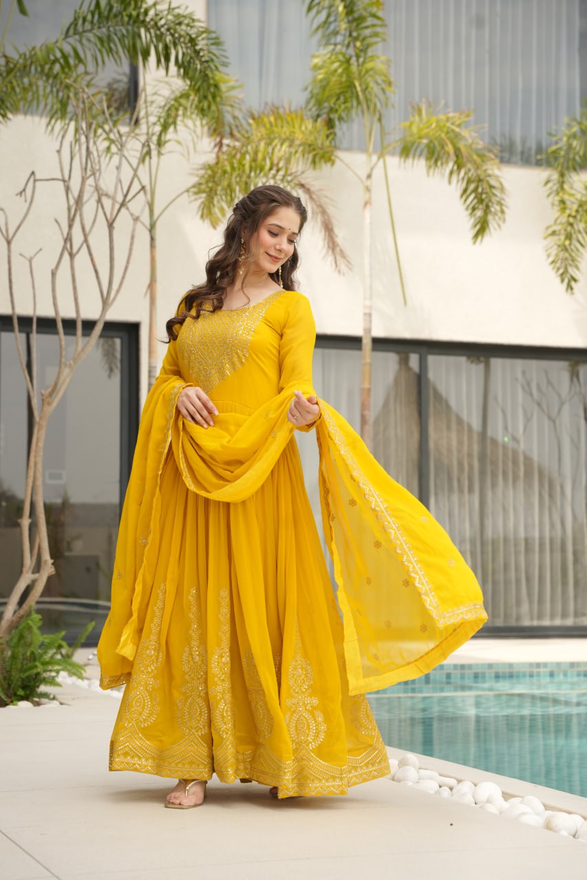 Reception Wear Yellow Color Faux Blooming With Embroidery Zari Sequins Work Designer Gown
