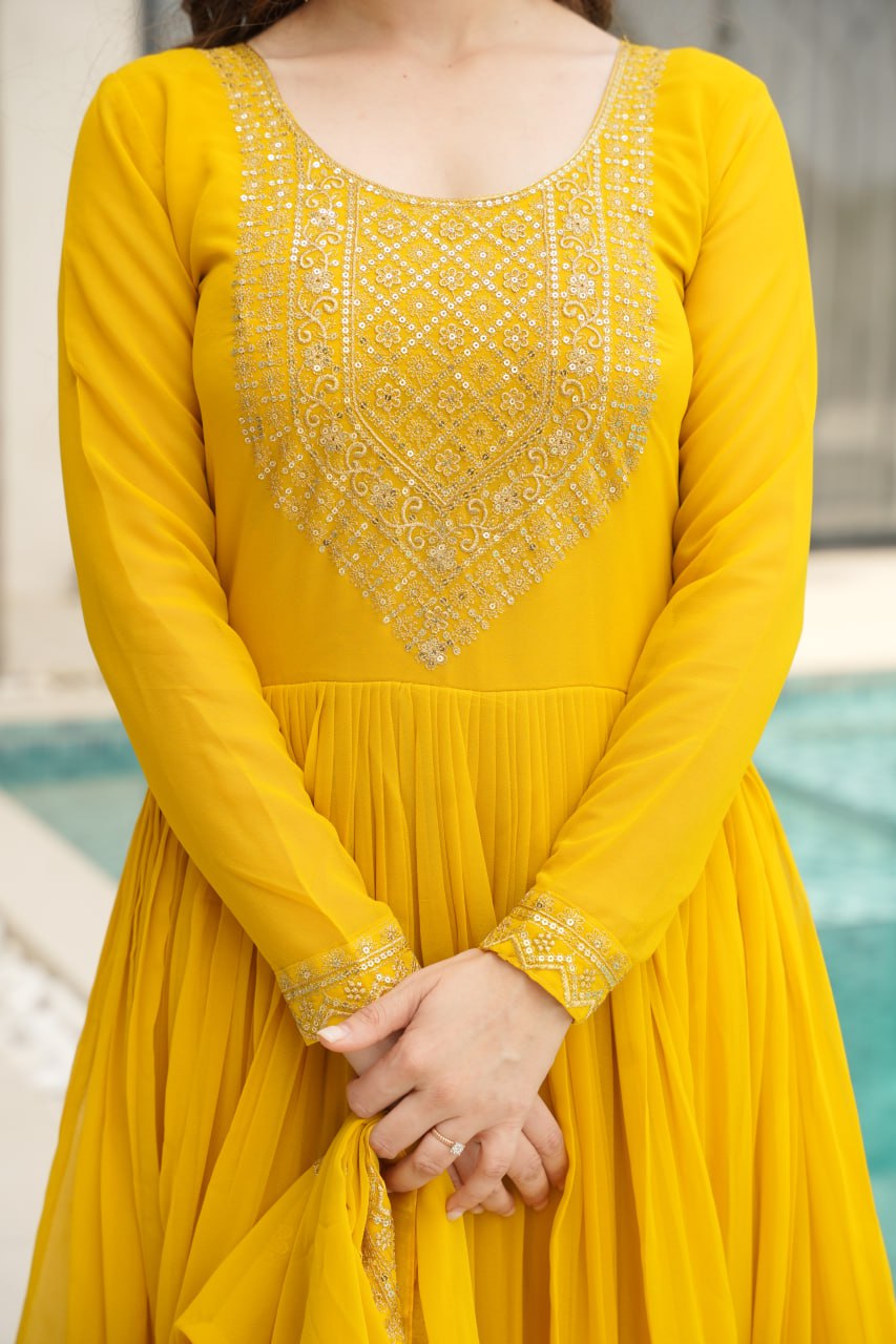 Reception Wear Yellow Color Faux Blooming With Embroidery Zari Sequins Work Designer Gown