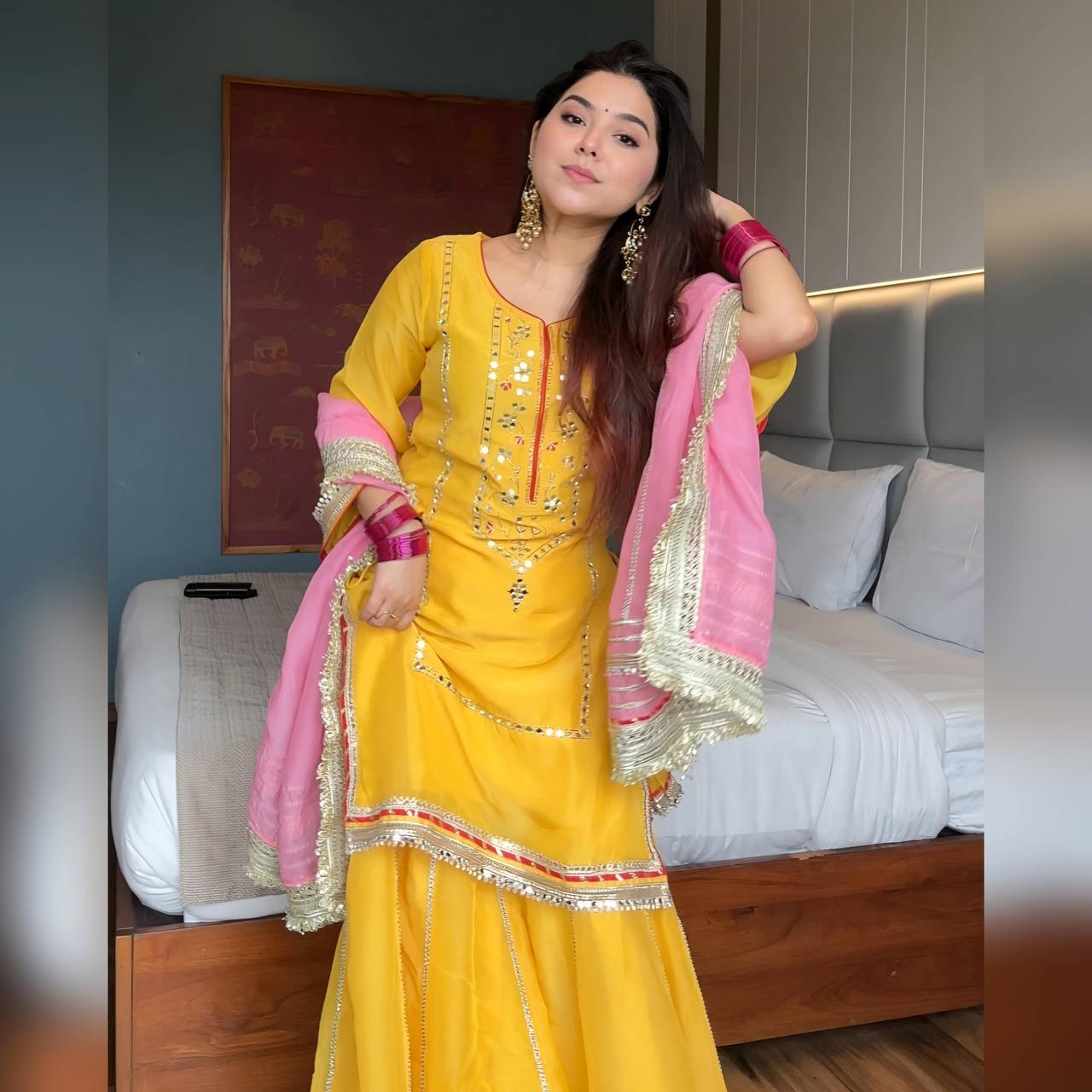 "Shop this stunning yellow sharara suit with beautiful mirror work and a contrasting pink dupatta. Ideal for Haldi, Mehndi, wedding guests, or festive celebrations. Available in multiple sizes with premium finish and elegant ethnic appeal."

"Yellow Sharara Suit with Mirror Work & Pink Dupatta – Festive & Haldi Wear for Women"

"Vibrant yellow sharara suit with intricate mirror work and pink dupatta – perfect traditional outfit for Haldi ceremony, wedding functions, and festive wear."



