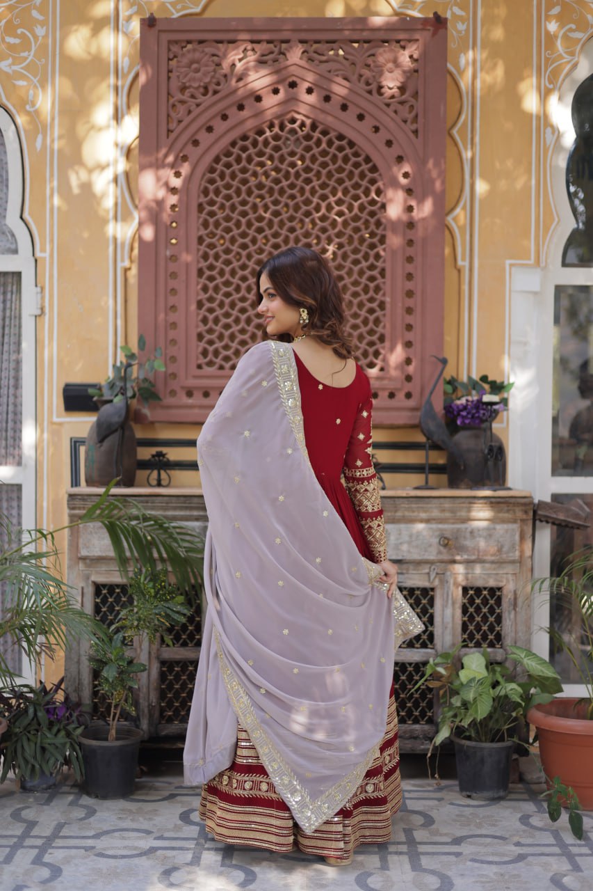 Outstanding Maroon Color Faux Blooming With Embroidery Zari Sequins Work Designer Gown