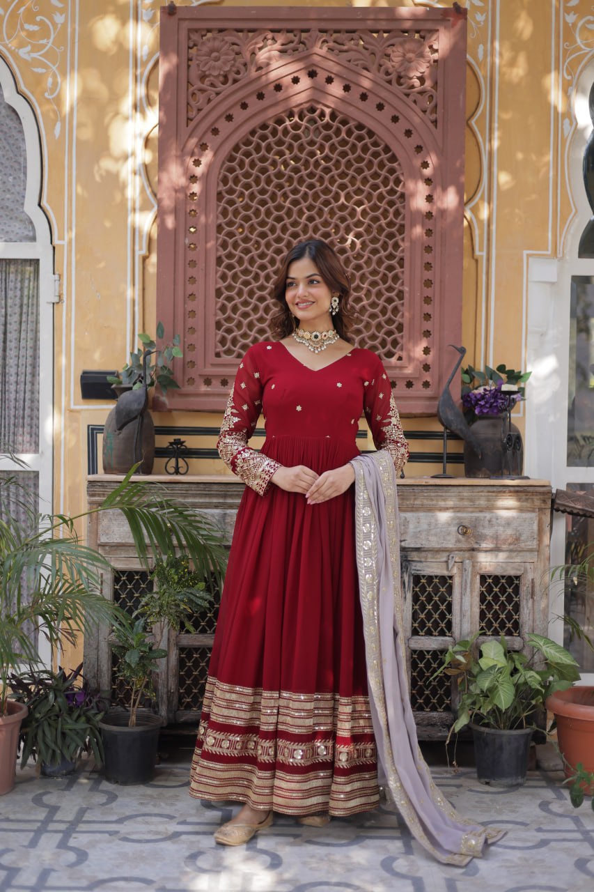 Outstanding Maroon Color Faux Blooming With Embroidery Zari Sequins Work Designer Gown