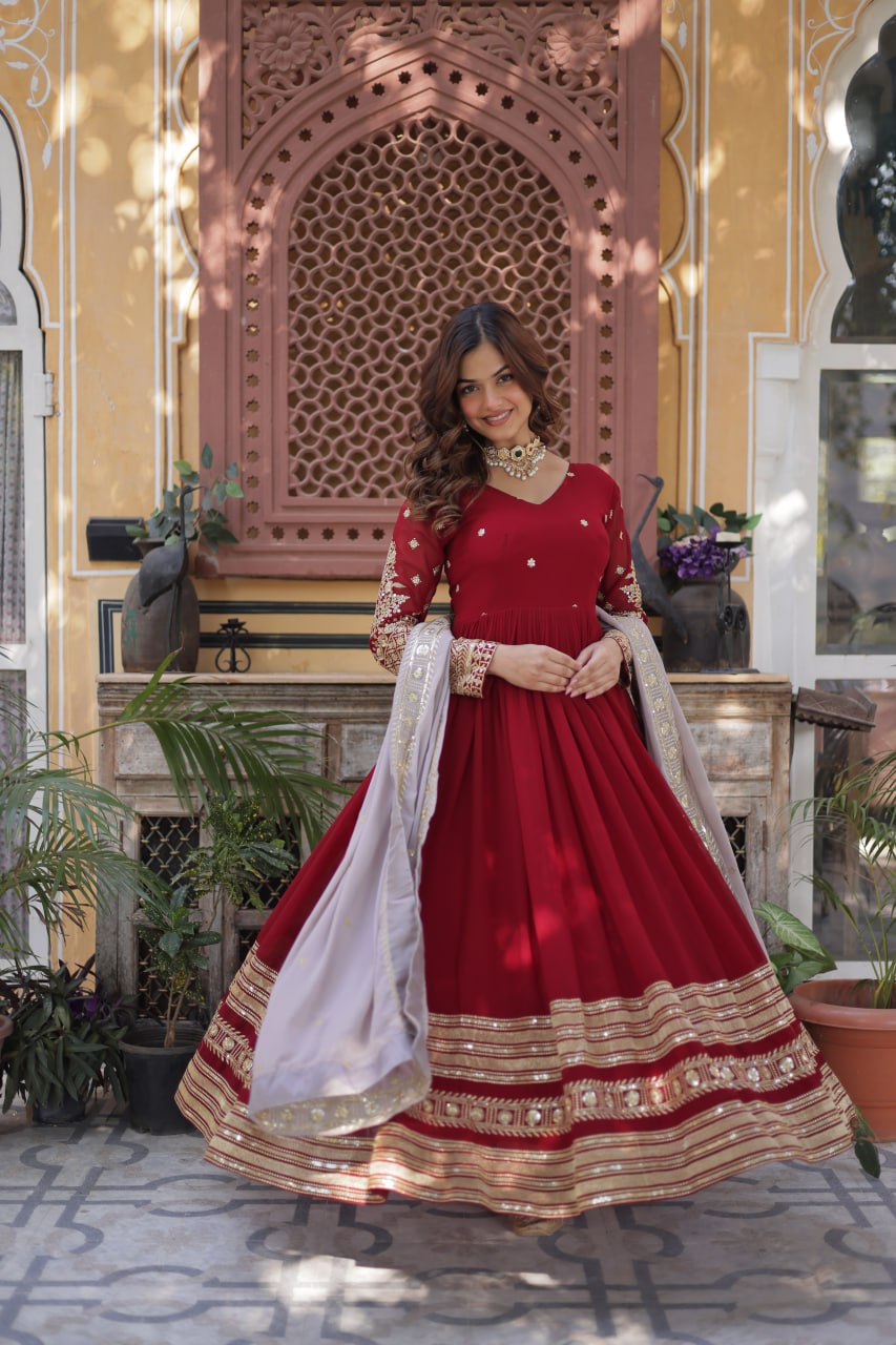 Outstanding Maroon Color Faux Blooming With Embroidery Zari Sequins Work Designer Gown