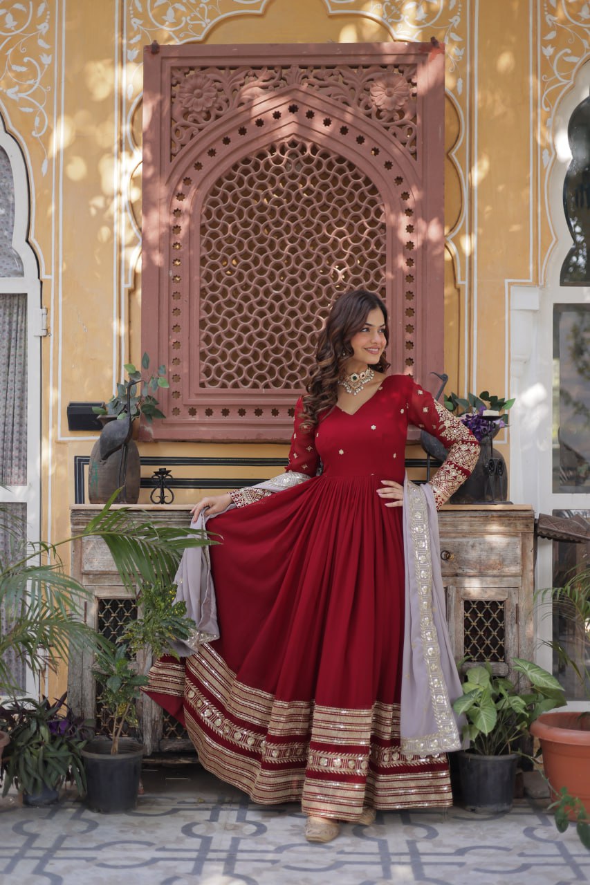 Outstanding Maroon Color Faux Blooming With Embroidery Zari Sequins Work Designer Gown