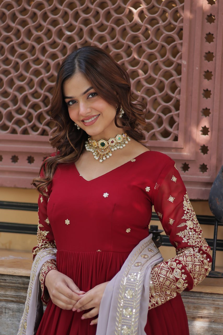 Outstanding Maroon Color Faux Blooming With Embroidery Zari Sequins Work Designer Gown