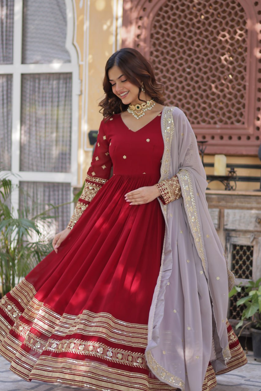Outstanding Maroon Color Faux Blooming With Embroidery Zari Sequins Work Designer Gown