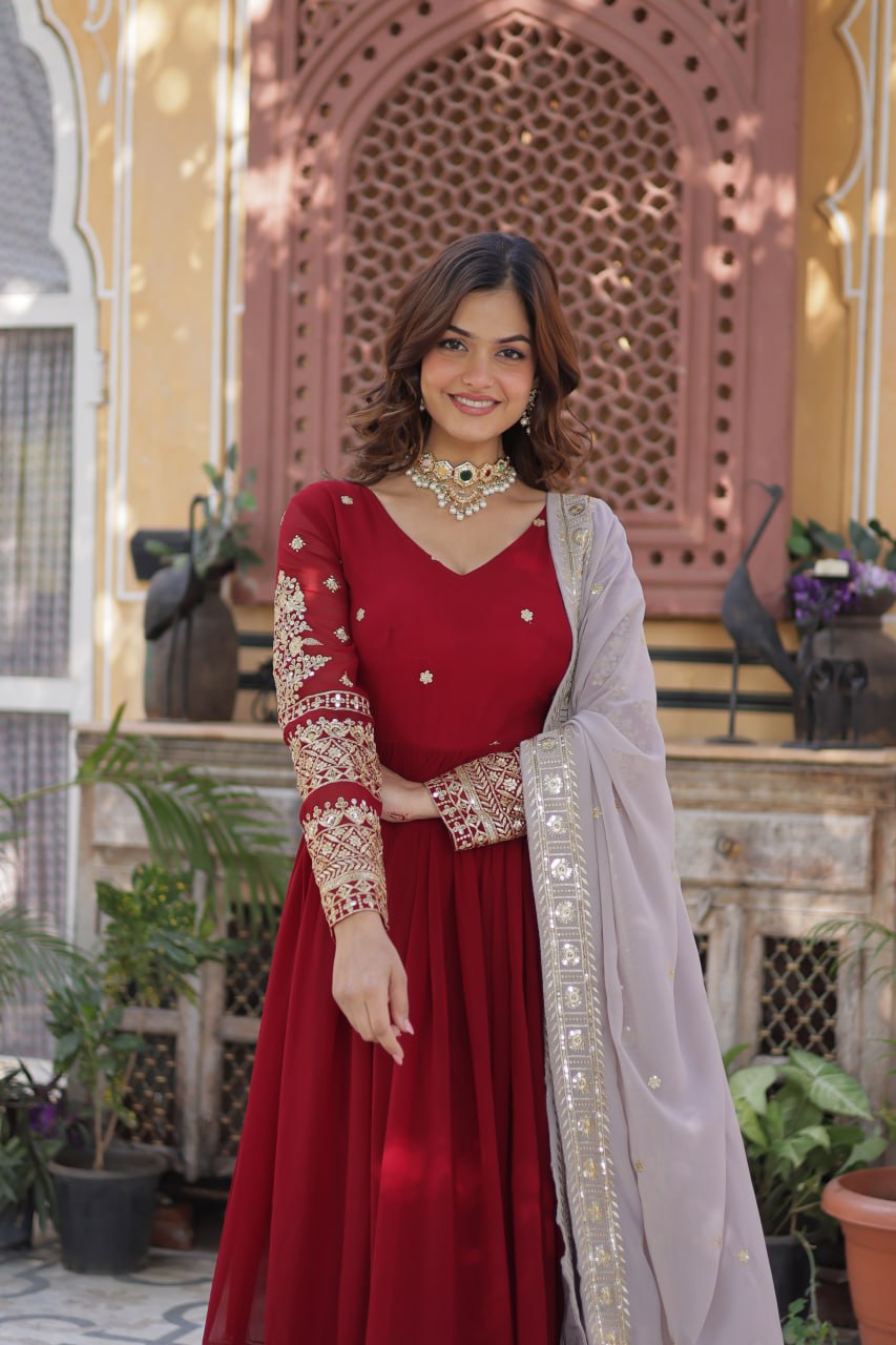 Outstanding Maroon Color Faux Blooming With Embroidery Zari Sequins Work Designer Gown