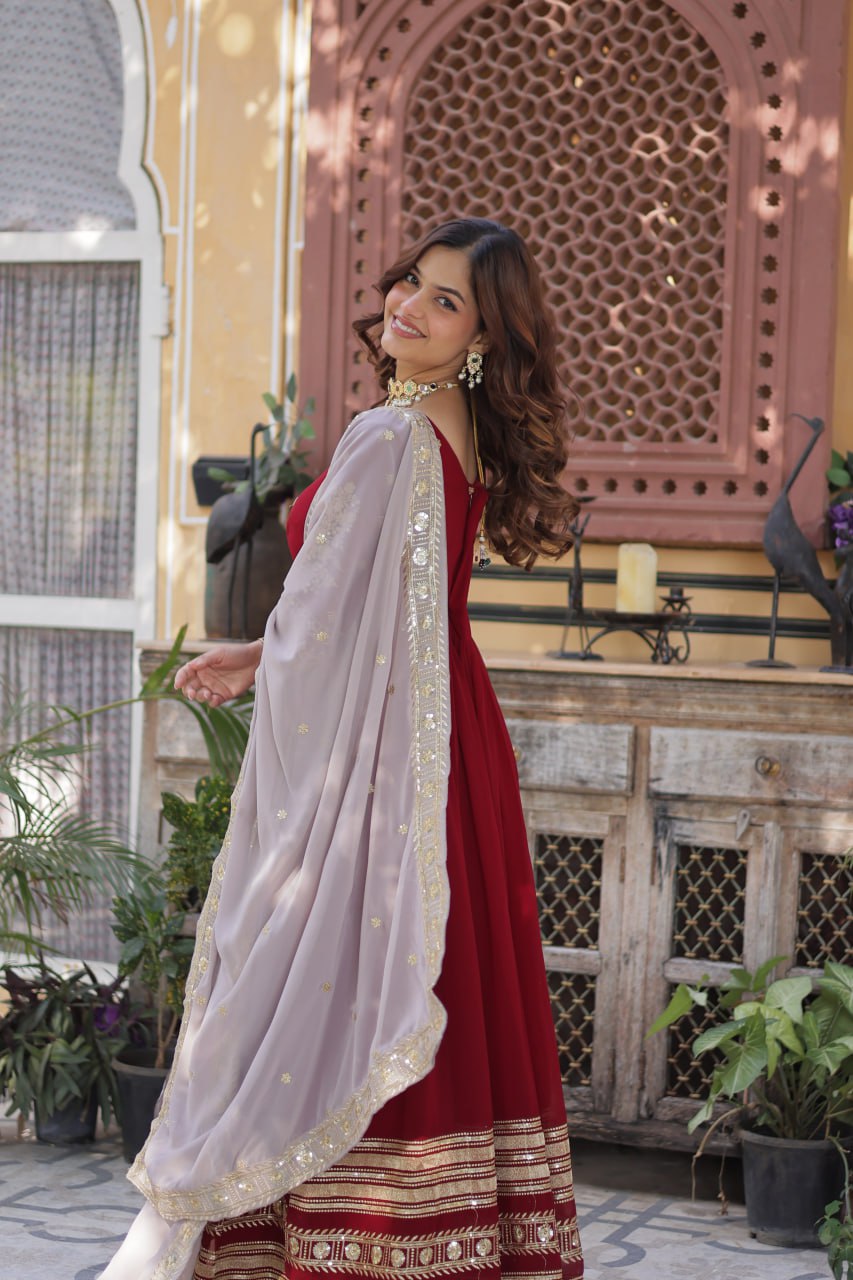 Outstanding Maroon Color Faux Blooming With Embroidery Zari Sequins Work Designer Gown