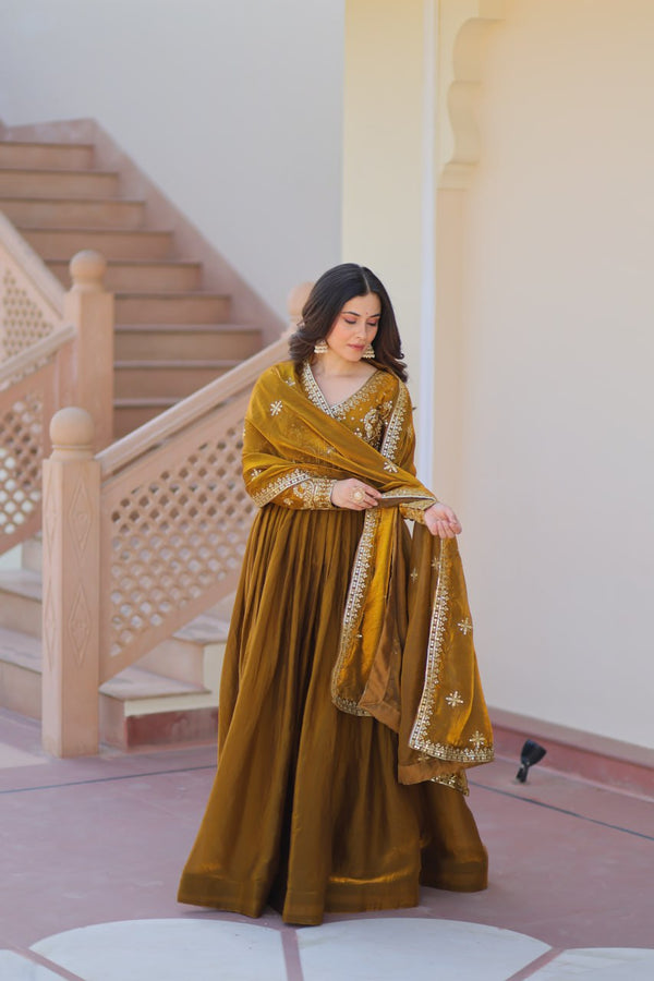 Occasion Wear Mahendi Color Zari And Sequins Embroidered Work Designer Gown