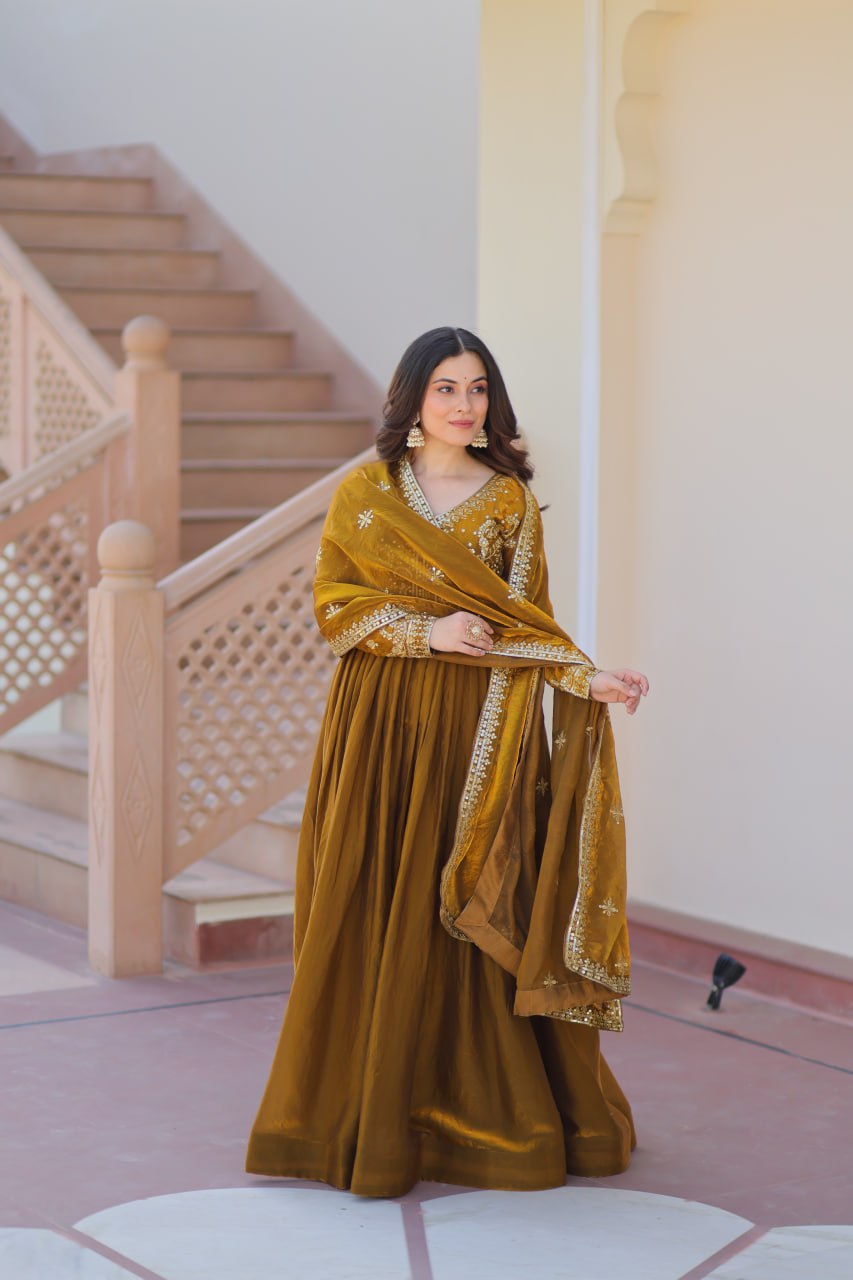 Occasion Wear Mahendi Color Zari And Sequins Embroidered Work Designer Gown