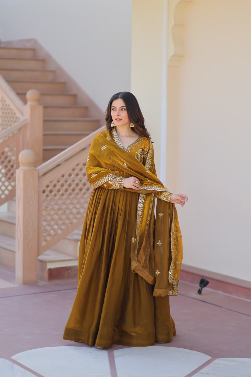 Occasion Wear Mahendi Color Zari And Sequins Embroidered Work Designer Gown