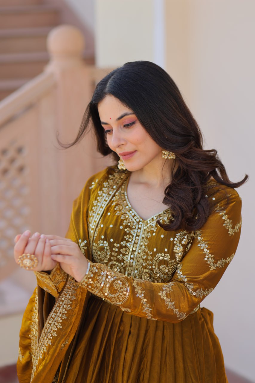 Occasion Wear Mahendi Color Zari And Sequins Embroidered Work Designer Gown
