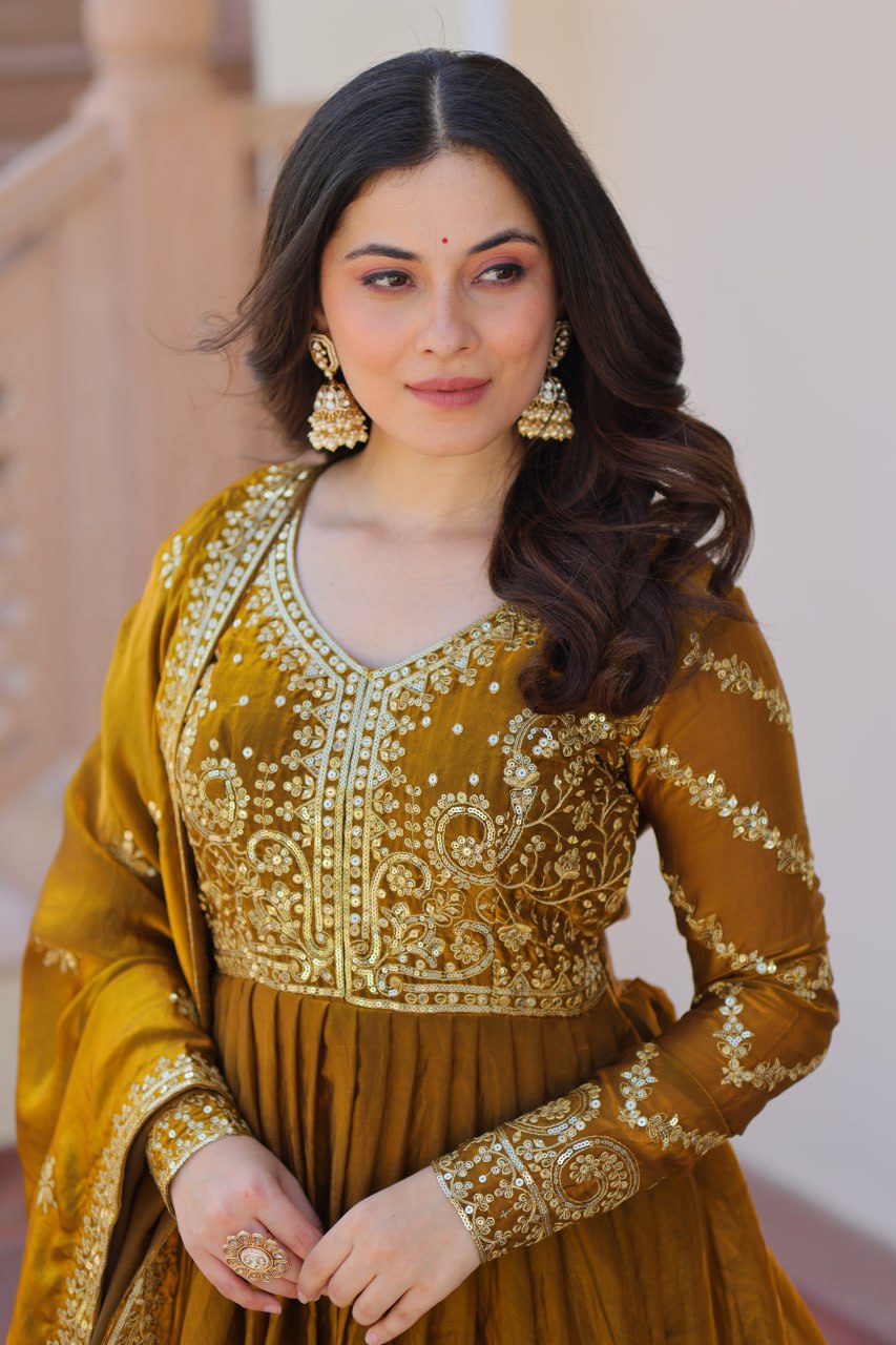 Occasion Wear Mahendi Color Zari And Sequins Embroidered Work Designer Gown