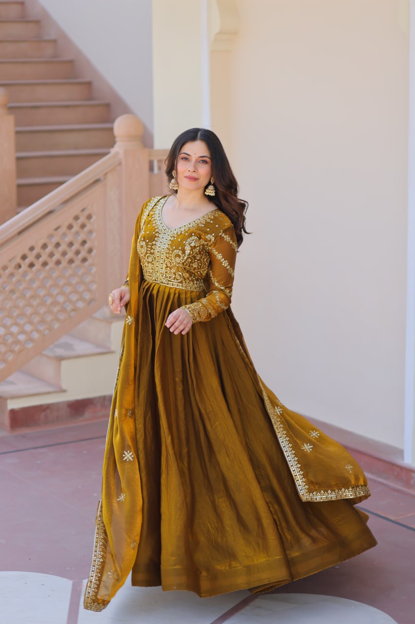 Occasion Wear Mahendi Color Zari And Sequins Embroidered Work Designer Gown