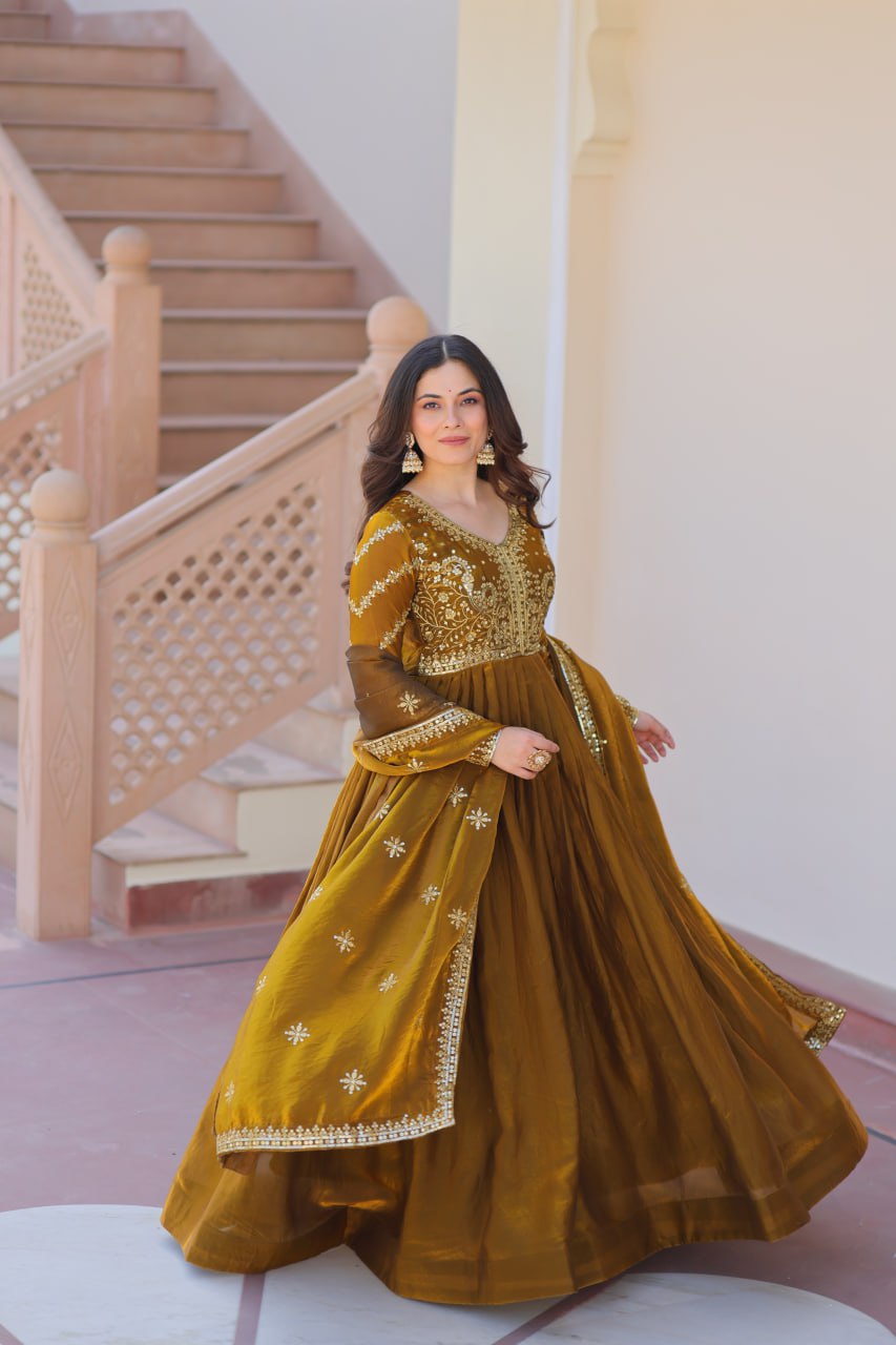 Occasion Wear Mahendi Color Zari And Sequins Embroidered Work Designer Gown
