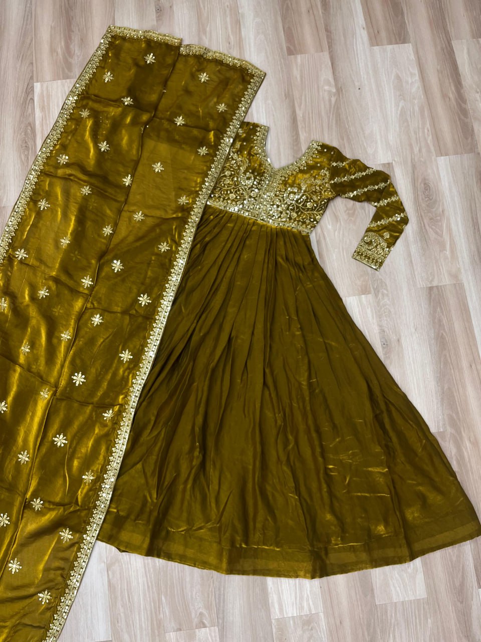 Occasion Wear Mahendi Color Zari And Sequins Embroidered Work Designer Gown