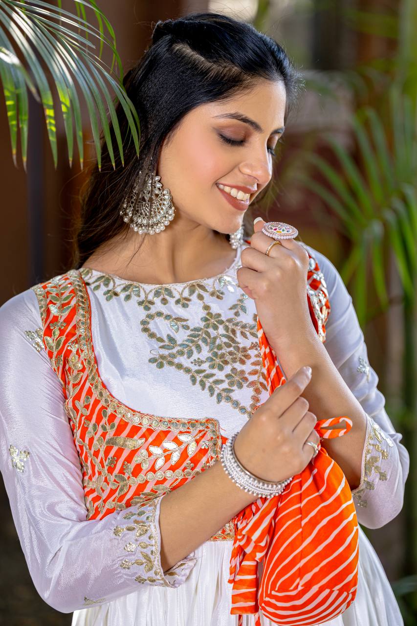 Traditional Wear Off White Color Pure Chinon With Laheriya Printed Beautiful Gown
