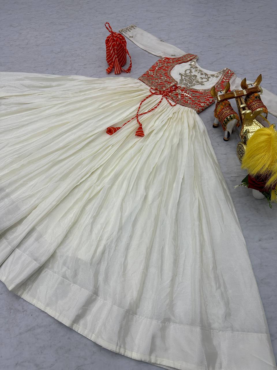 Traditional Wear Off White Color Pure Chinon With Laheriya Printed Beautiful Gown