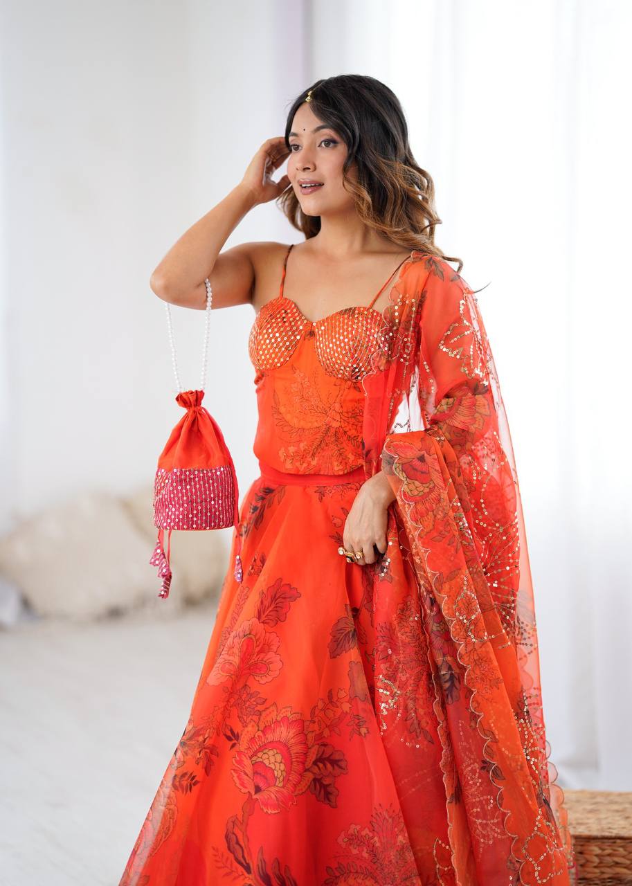 Arti Chauhan's Orange Organza Readymade Lehenga Choli Set With Designer Batwa