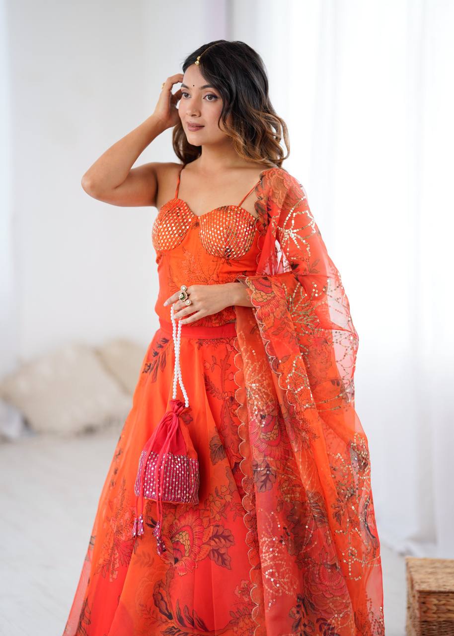 Arti Chauhan's Orange Organza Readymade Lehenga Choli Set With Designer Batwa