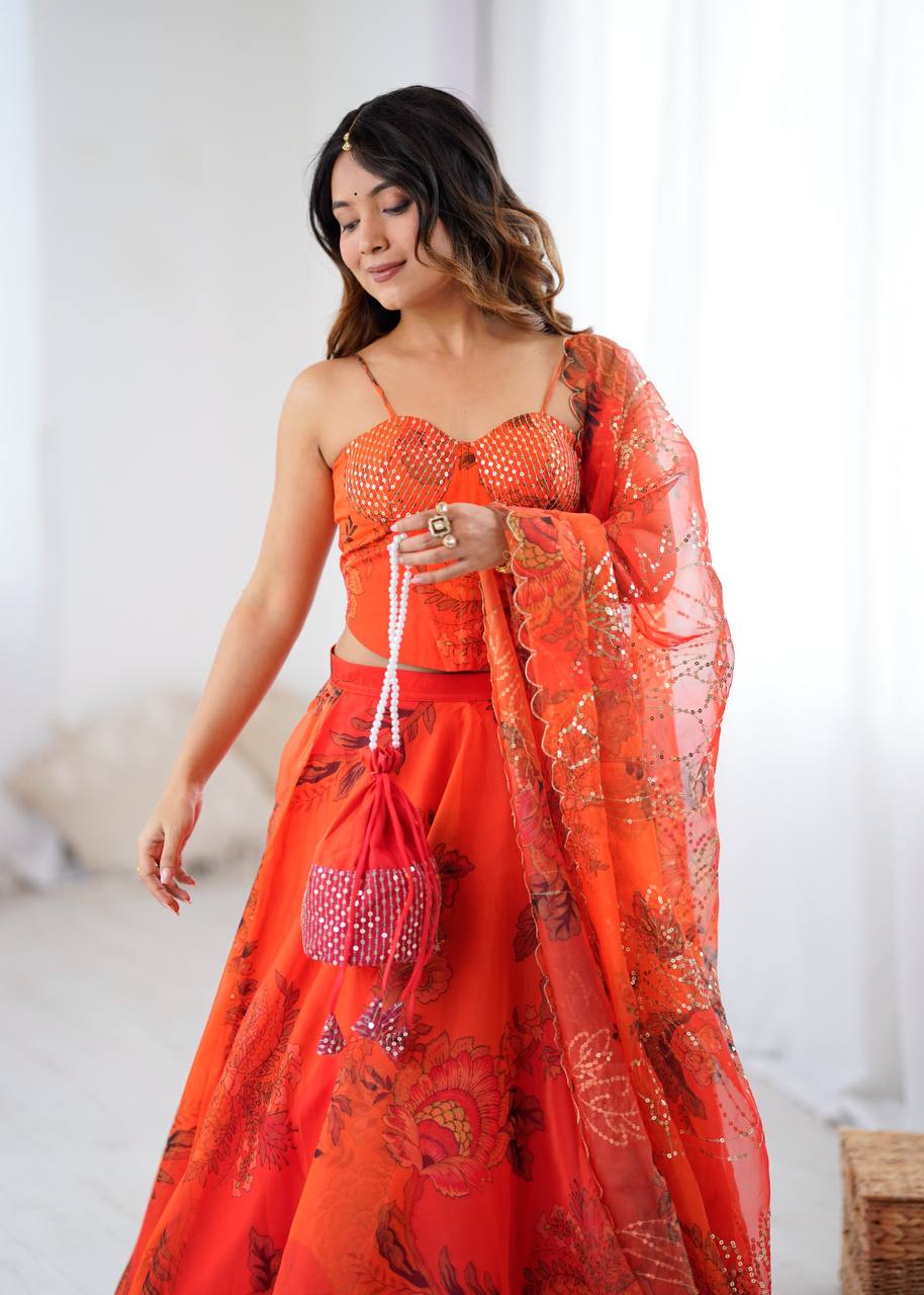 Arti Chauhan's Orange Organza Readymade Lehenga Choli Set With Designer Batwa