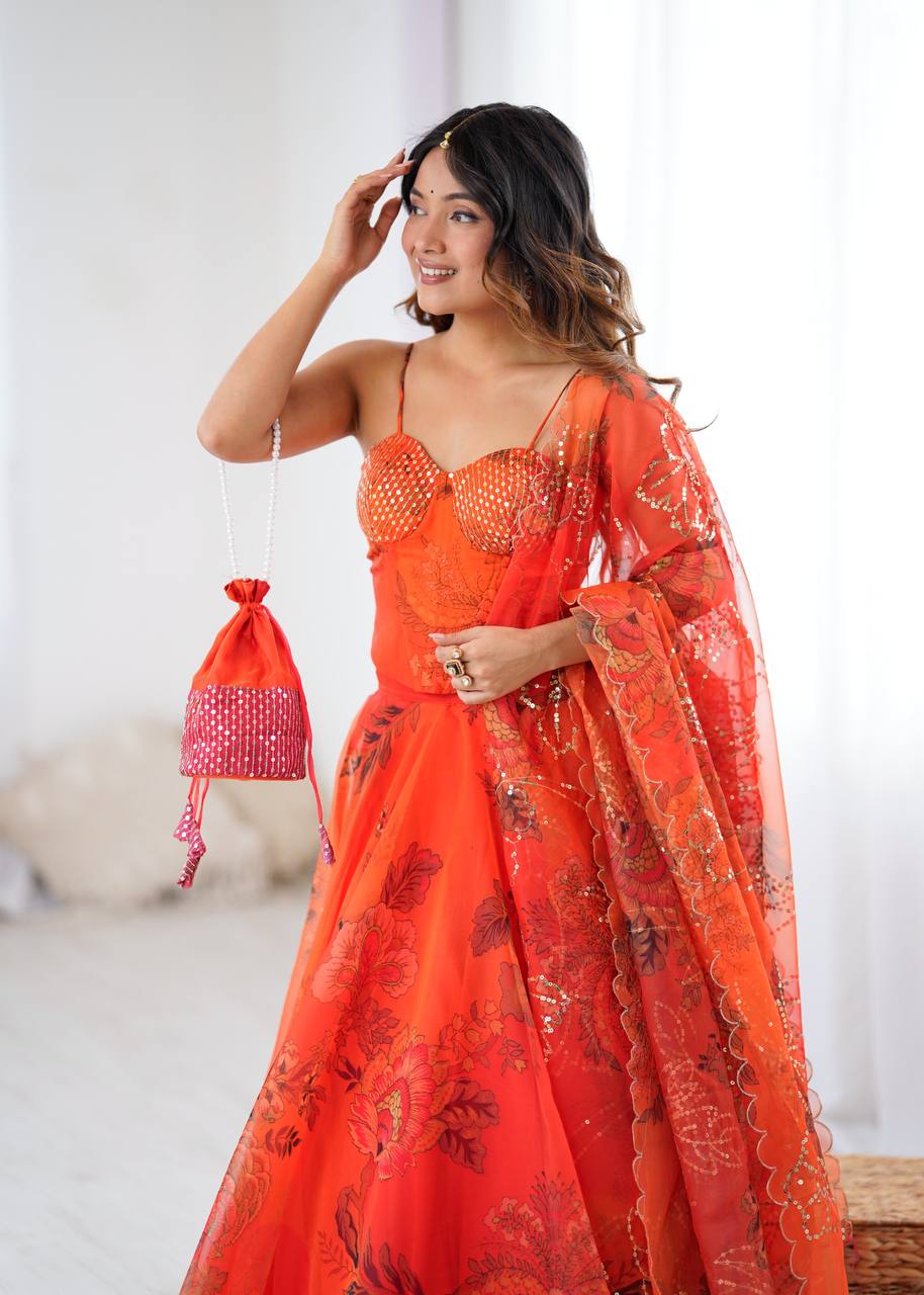 Arti Chauhan's Orange Organza Readymade Lehenga Choli Set With Designer Batwa