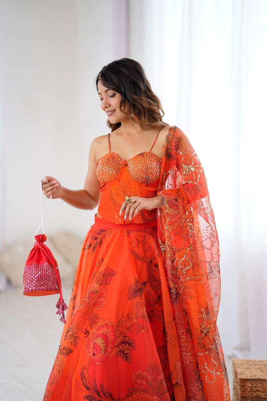 Arti Chauhan's Orange Organza Readymade Lehenga Choli Set With Designer Batwa