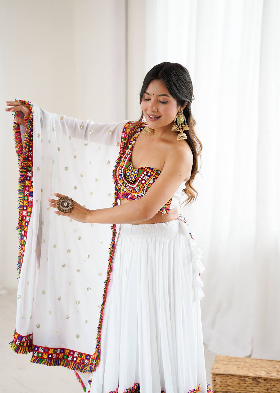 Arti Chauhan's White Color Gamthi Work Navratril Lehenga Choli