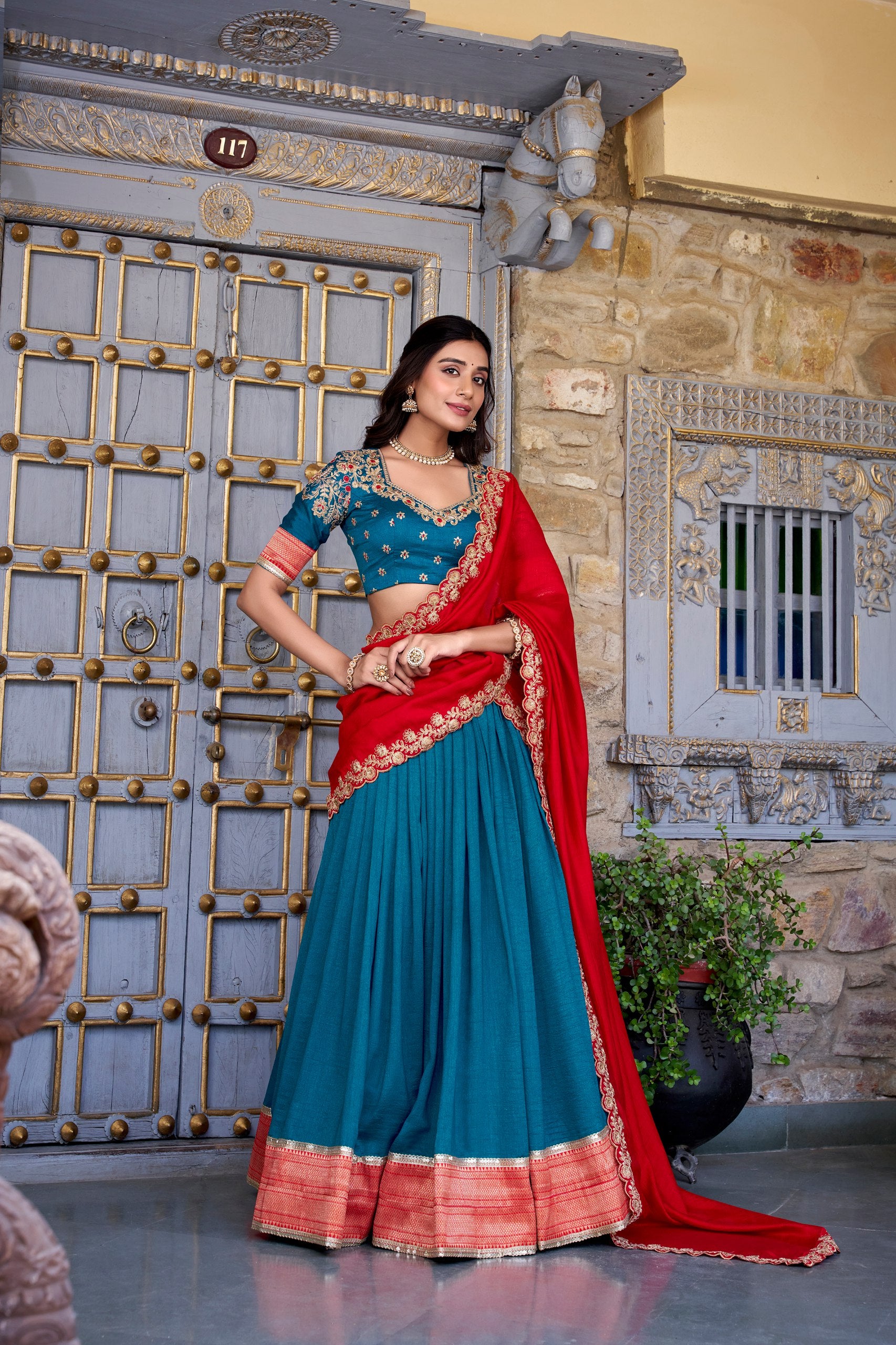 Traditional Wear Teal Color Vichitra Silk With Zari Weaving Work Lehenga Choli